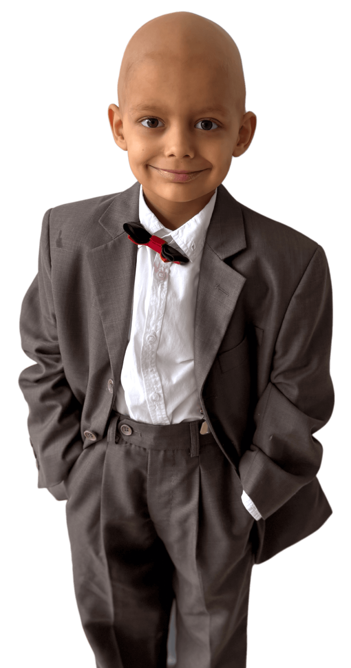 Aleks in a formal suit with a red bow tie