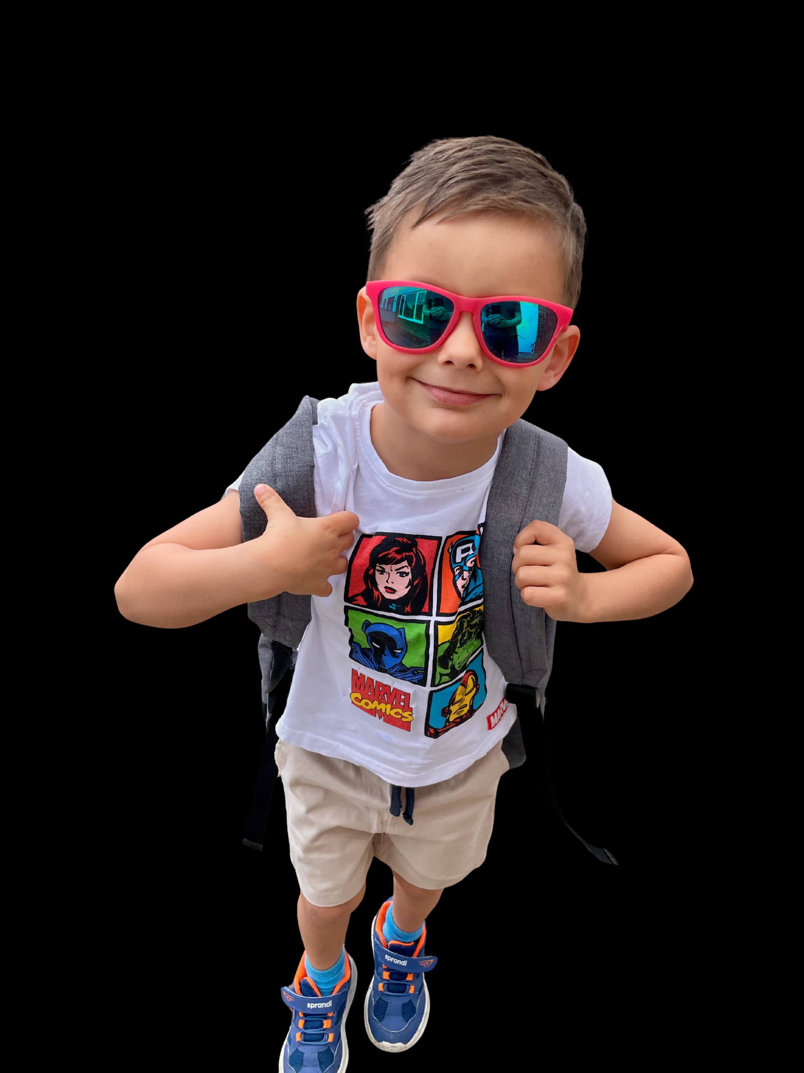 Aleks with backpack and sunglasses, ready for his journey