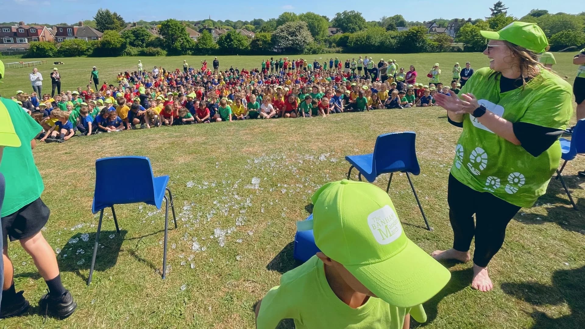 Community event at Red Hill with hundreds of children gathered in support, showing the TeamAleks campaign bringing people together